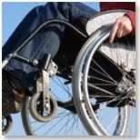 An individual sitting in a wheelchair