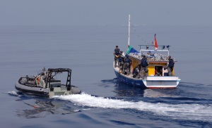 Australian Navy personnel responding to boat arrival